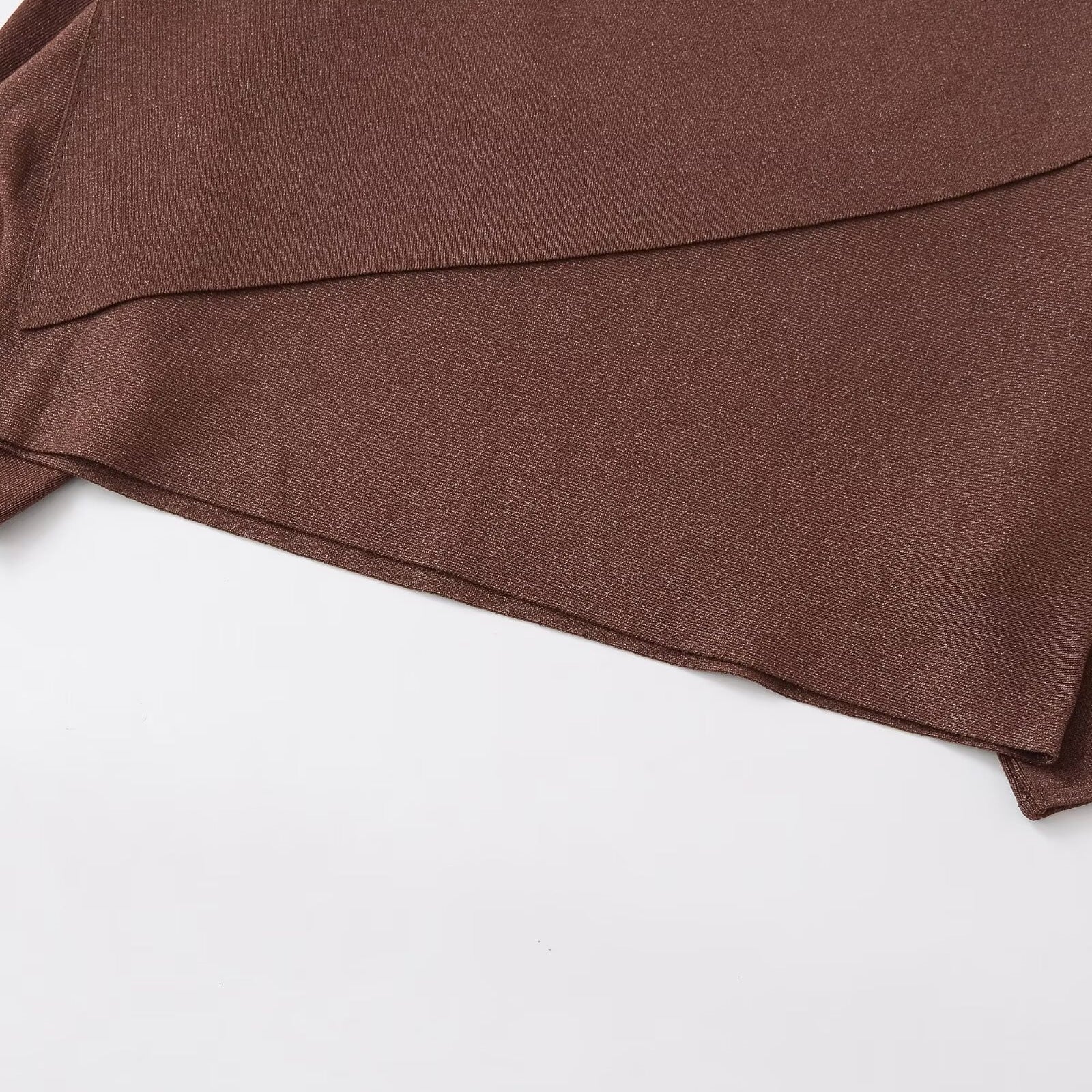 Loose metallic thread knitted cape