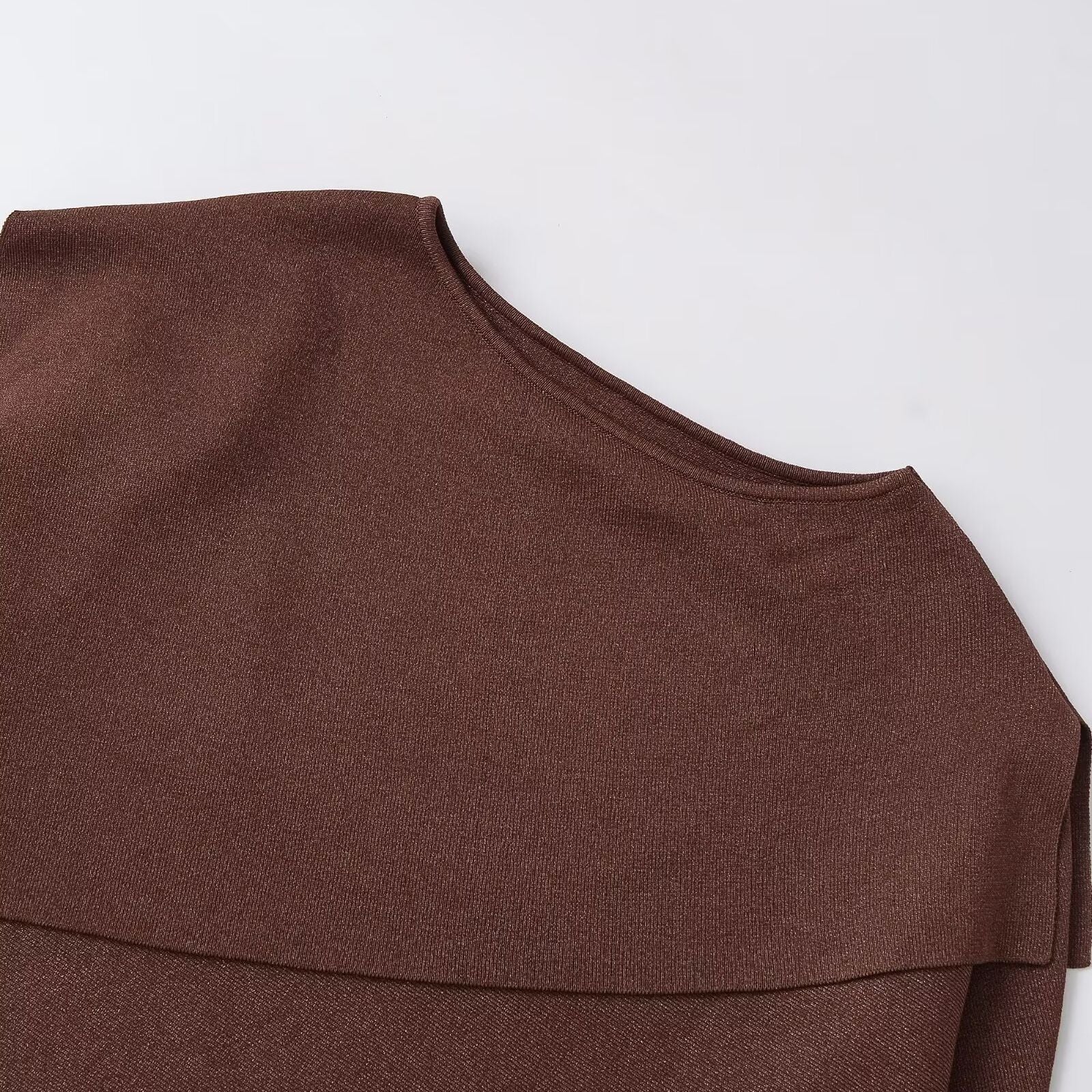 Loose metallic thread knitted cape